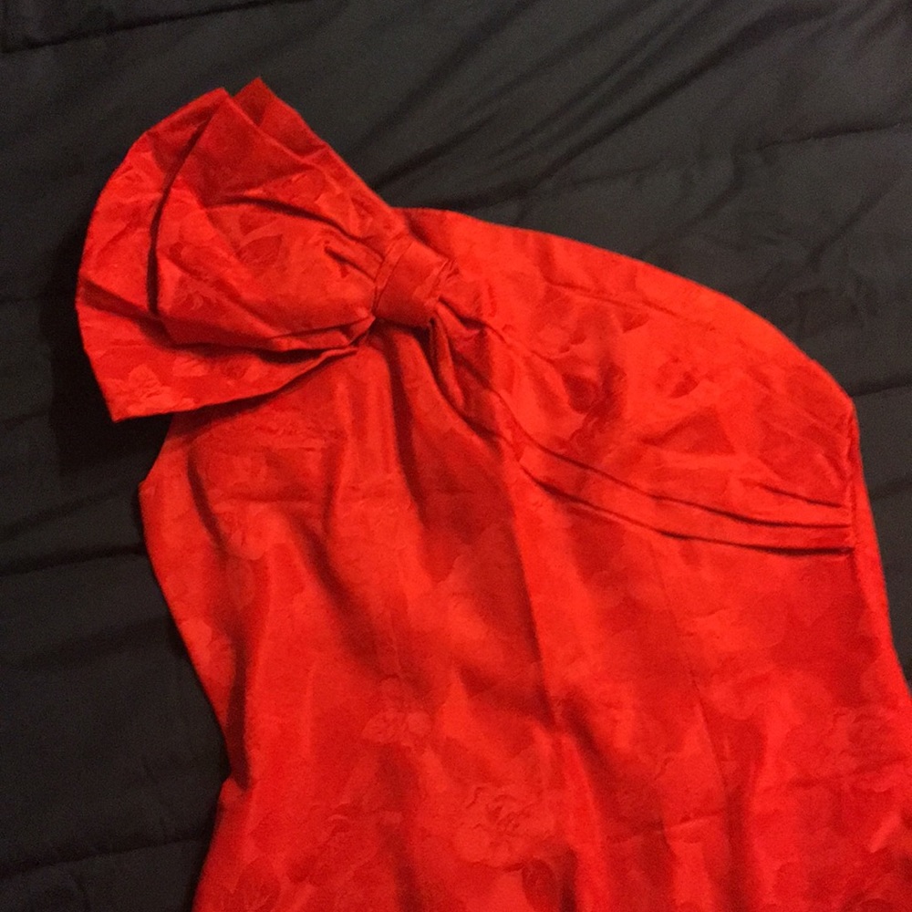 Red one shoulder strapped evening gown